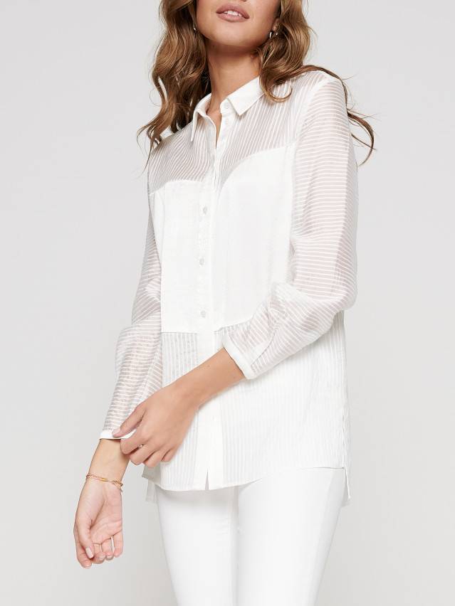 Блуза жіноча із текстильної тканини, комбінована с довгим втачним рукавом і манжетами по низу. По переду і спінке виконані - 1