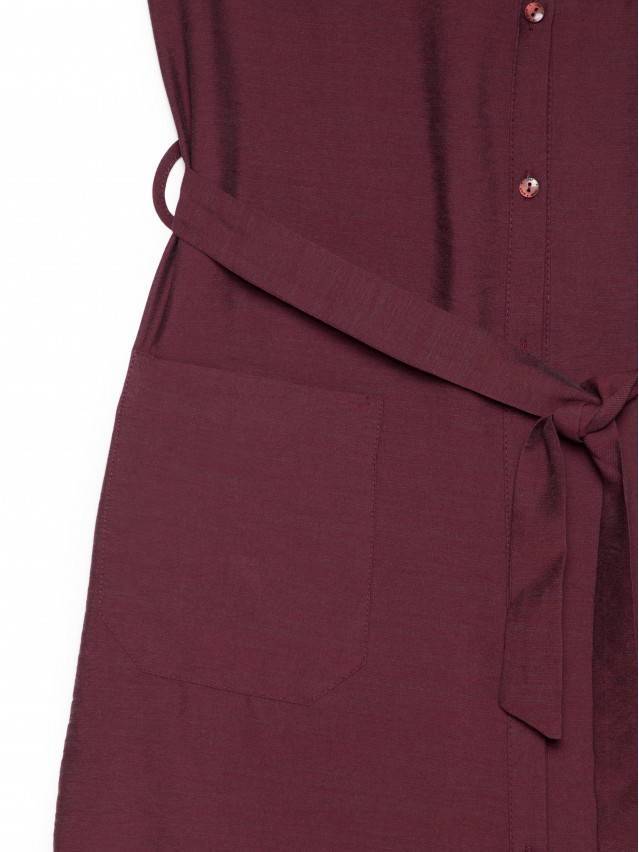 Сукня жіноча з однотонної текстильної тканини без рукавів. Горловина оброблена відкладним коміром на стойці. По переду сукня - 3